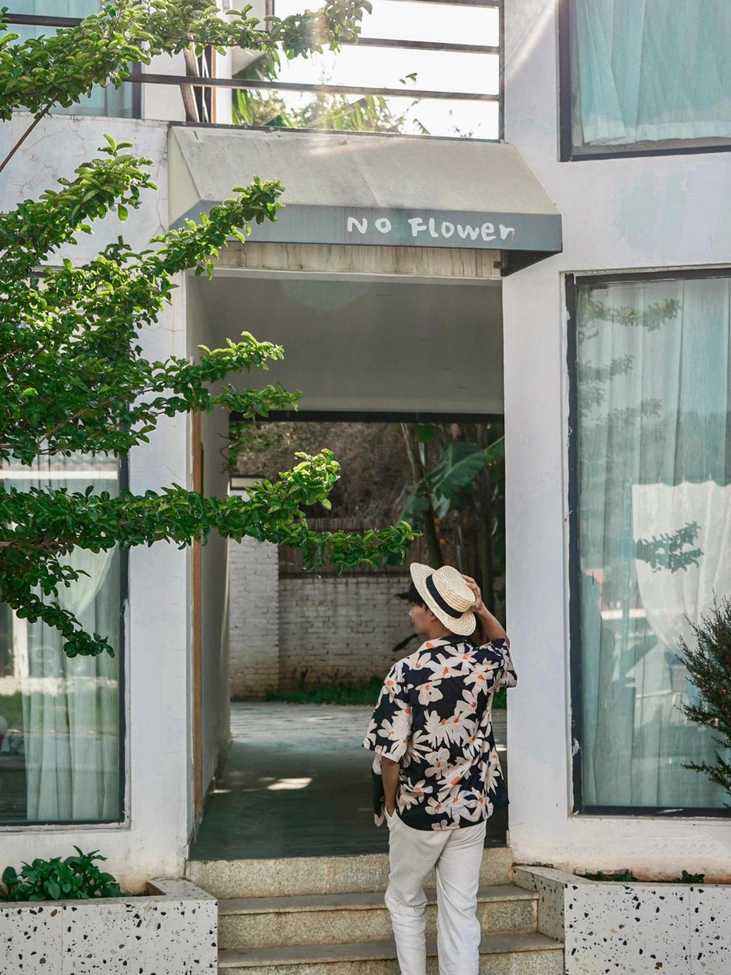 No Flowers Boutique Hostel Kunming Extérieur photo